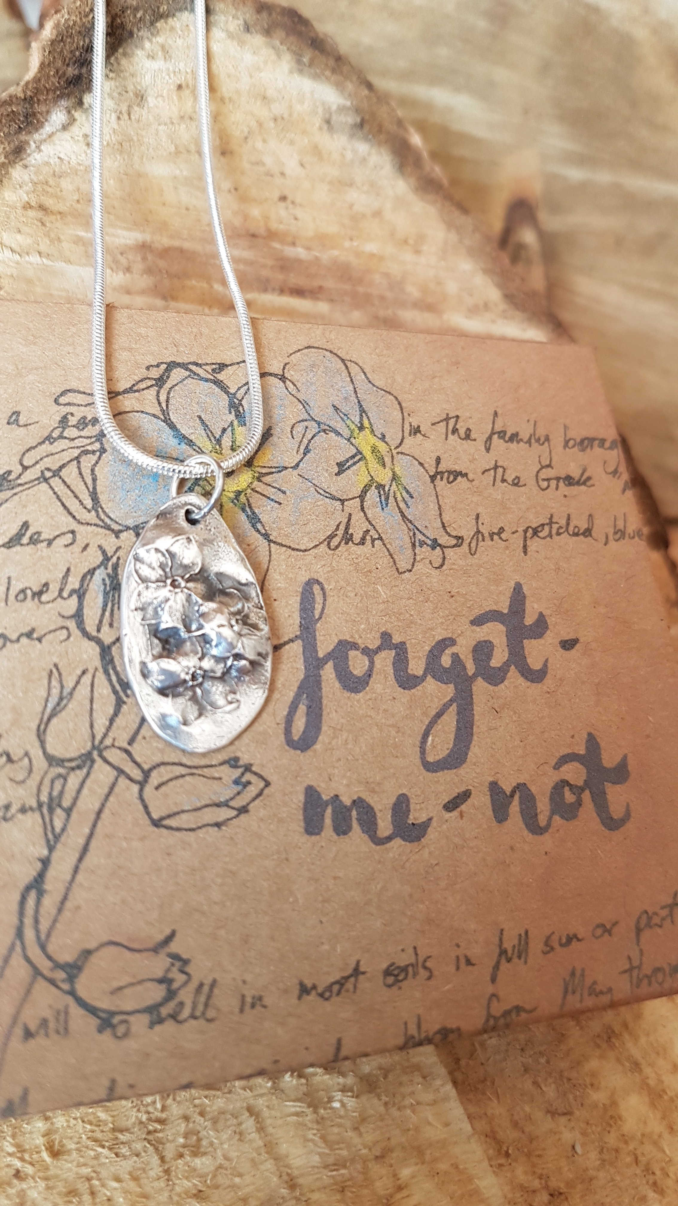 Forget-me-not charm